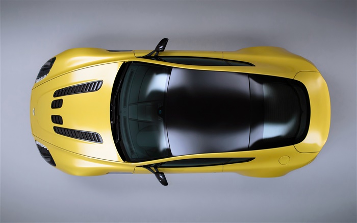 阿斯頓·馬丁V12 Vantage的黃色跑車頂視圖 桌布 圖片