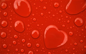 水滴，愛的心，紅色背景
