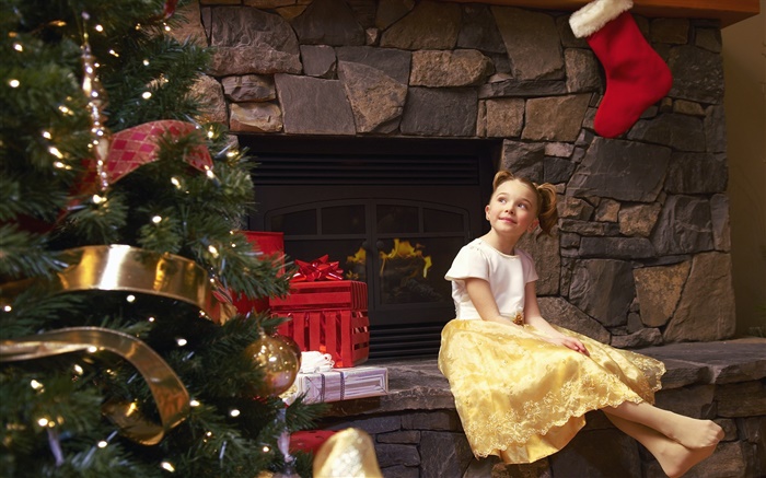 快樂的小女孩在聖誕節 桌布 圖片