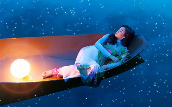 在船上亞洲女孩晚上睡覺 桌布 圖片