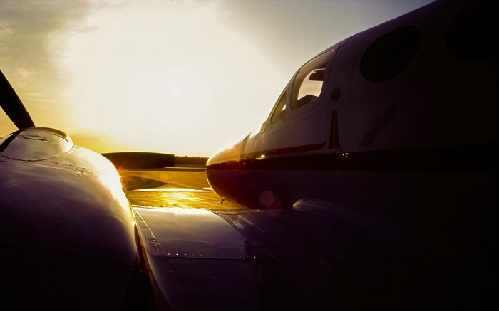C3塞斯納飛機在日落，機場 桌布 圖片
